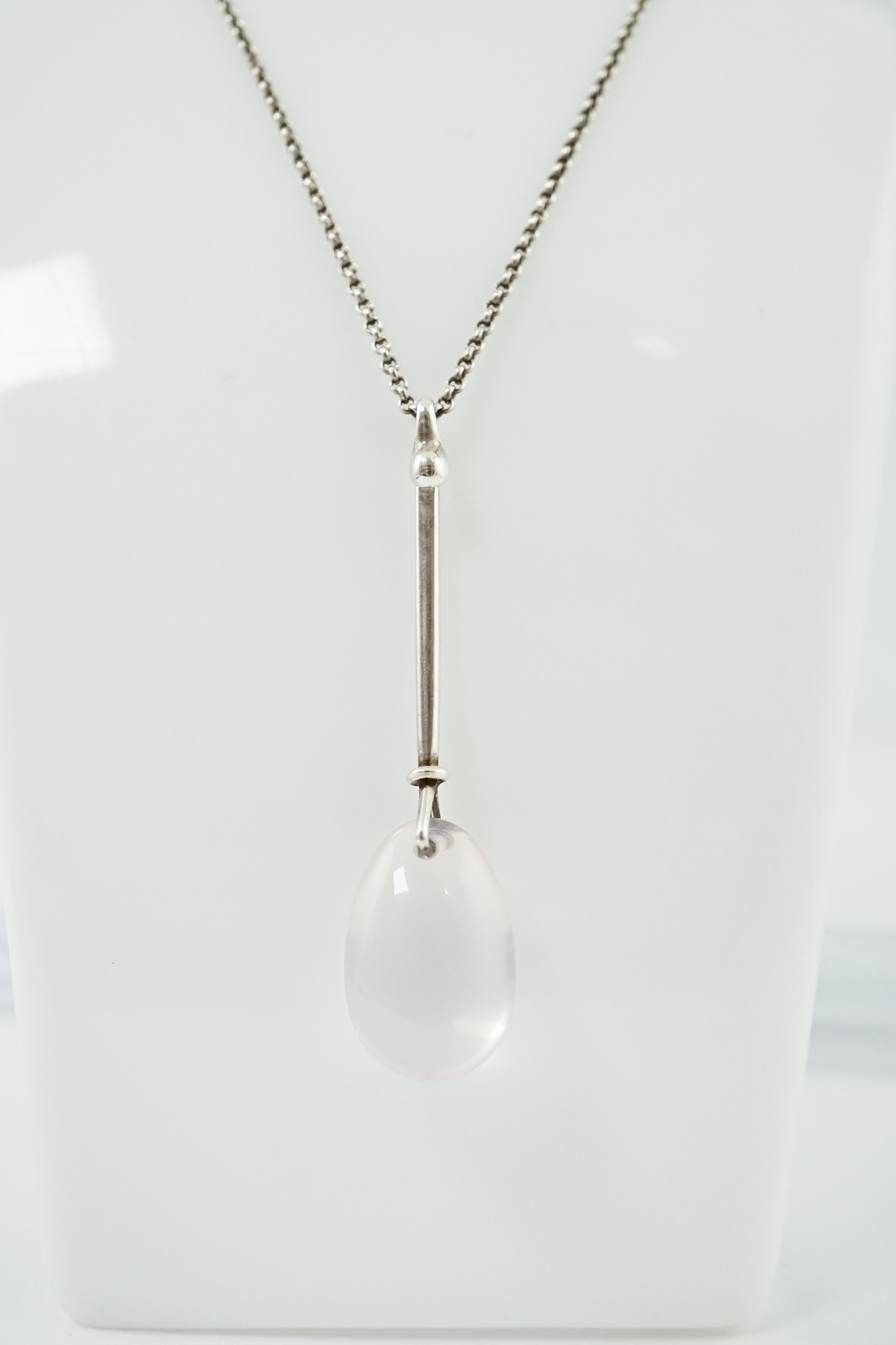 A Vivianna Torun Bülow-Hübe for Georg Jensen sterling silver and rose quartz set drop pendant, on a Georg Jensen sterling silver chain